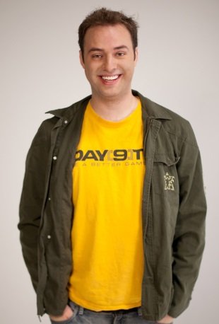 Sean Day[9] Plott wearing a Day9 Yellow shirt with his logo underneath a brown starcraft jacket